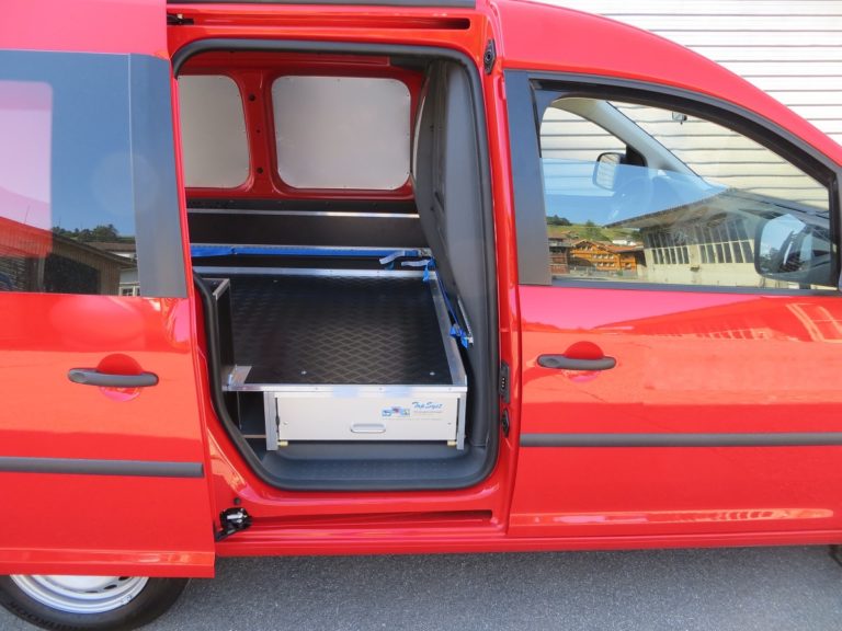 VW Caddy - Doppelter Boden. Seitenschublade.
